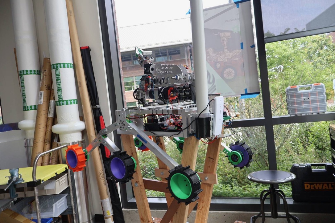 A rover on a wooden stand.